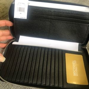 MK Jetsetter travel wallet